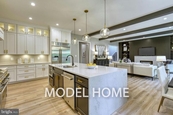 Fireplace, Interior, Kitchen, Living room, Pendant Lights, Recessed Lighting, Stainless Steel Appliances, Wood Texture Flooring