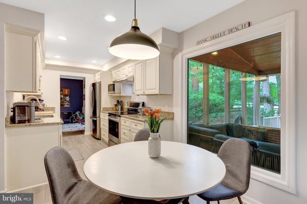 Dining room, Interior, Kitchen, Pendant Lights, Recessed Lighting, Stainless Steel Appliances, Wood Texture Flooring