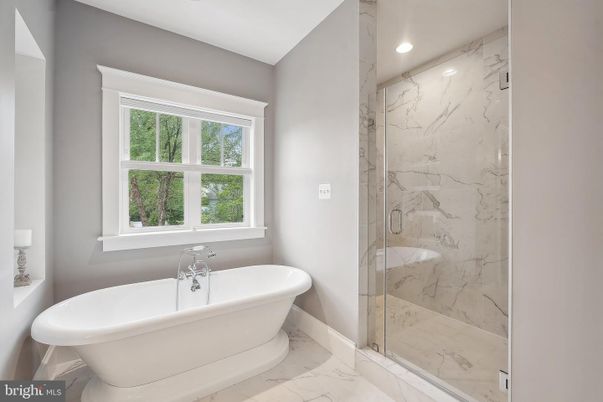 Bathroom, Free Standing Baths, Glass Shower, Interior, Marble, Marble Walls, Recessed Lighting