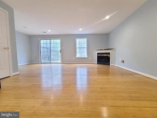 Empty room, Fireplace, Interior, Recessed Lighting, Wood Texture Flooring