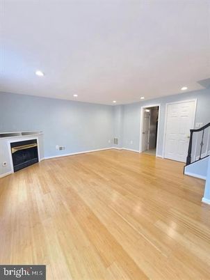Empty room, Fireplace, Interior, Recessed Lighting, Wood Texture Flooring