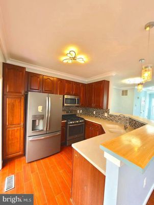 Interior, Kitchen, Pendant Lights, Stainless Steel Appliances, Wood Texture Flooring