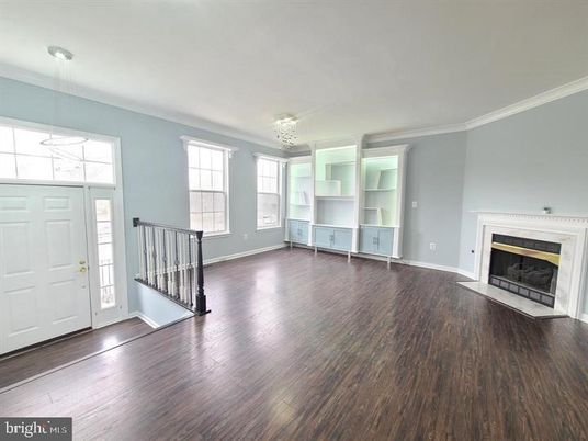 Empty room, Fireplace, Interior, Pendant Lights, Wood Texture Flooring