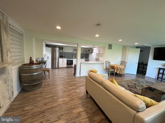 Dining room, Interior, Kitchen, Living room, Recessed Lighting, Stainless Steel Appliances, Wood Texture Flooring