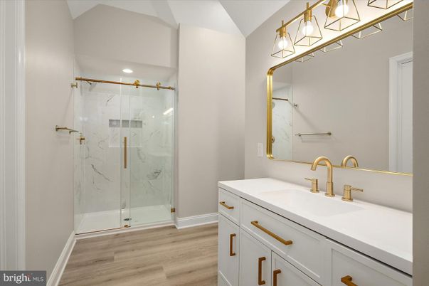 Bathroom, Glass Shower, Interior, Marble Walls, Recessed Lighting, Wood Texture Flooring
