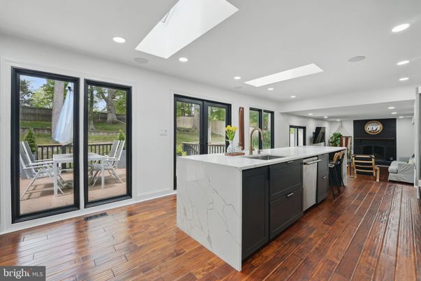 Fireplace, Interior, Kitchen, Recessed Lighting, Wood Texture Flooring