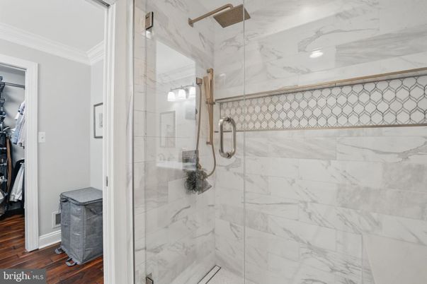 Bathroom, Glass Shower, Interior, Marble Walls, Wood Texture Flooring