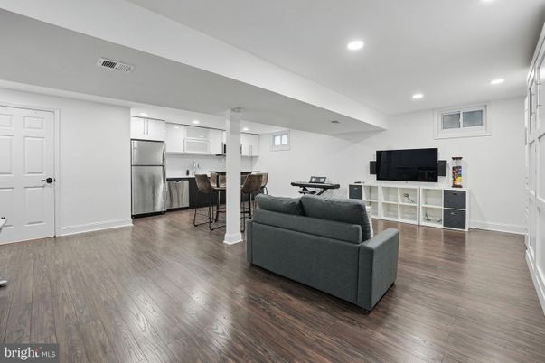 Dining room, Interior, Kitchen, Living room, Recessed Lighting, Stainless Steel Appliances, Wood Texture Flooring