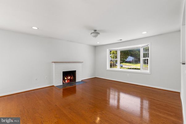 Empty room, Fireplace, Interior, Recessed Lighting, Wood Texture Flooring
