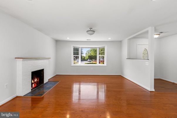 Empty room, Fireplace, Interior, Recessed Lighting, Wood Texture Flooring
