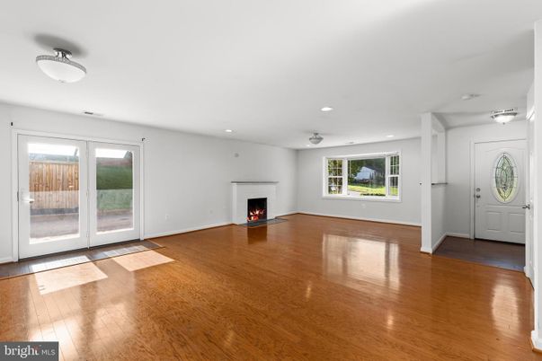 Empty room, Fireplace, Interior, Recessed Lighting, Wood Texture Flooring