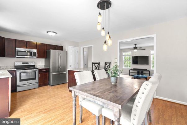 Dining room, Interior, Kitchen, Pendant Lights, Stainless Steel Appliances, Wood Texture Flooring