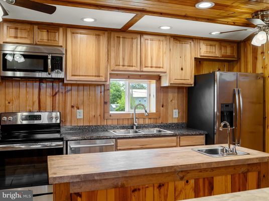 Interior, Kitchen, Recessed Lighting, Stainless Steel Appliances, Wooden Walls