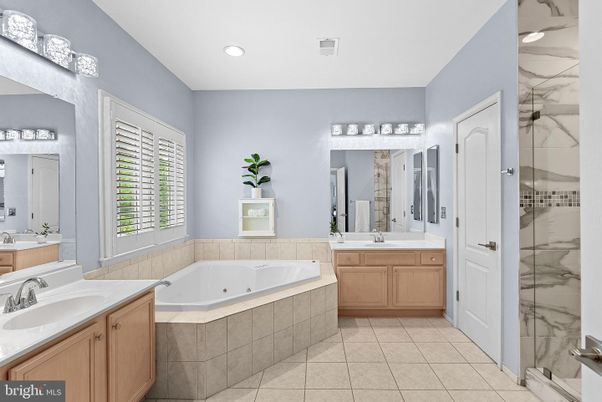 Bathroom, Dual Sink Vanities, Interior, Marble Walls, Recessed Lighting