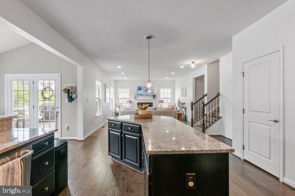 Dining room, Fireplace, Interior, Kitchen, Living room, Pendant Lights, Recessed Lighting, Wood Texture Flooring