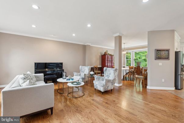 Dining room, Interior, Living room, Pendant Lights, Piano, Recessed Lighting, Wood Texture Flooring