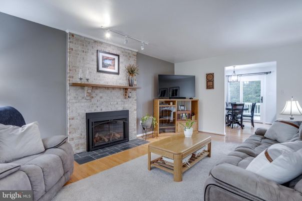 Dining room, Fireplace, Interior, Living room, Stone Walls, Wood Texture Flooring