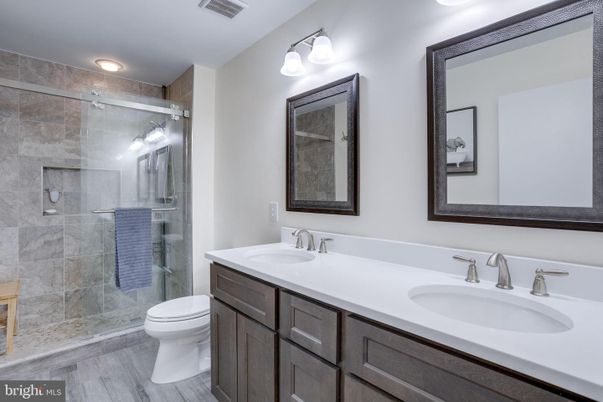 Bathroom, Dual Sink Vanities, Glass Shower, Interior, Wood Texture Flooring