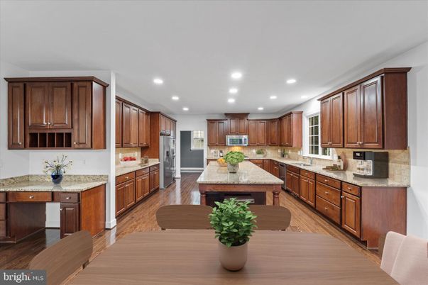 Dining room, Interior, Kitchen, Recessed Lighting, Stainless Steel Appliances, Wood Texture Flooring