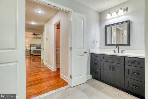 Bathroom, Bedroom, Dual Sink Vanities, Interior, Recessed Lighting, Wood Texture Flooring