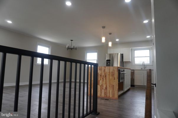 Chandelier, Interior, Kitchen, Pendant Lights, Recessed Lighting, Stainless Steel Appliances, Wood Texture Flooring