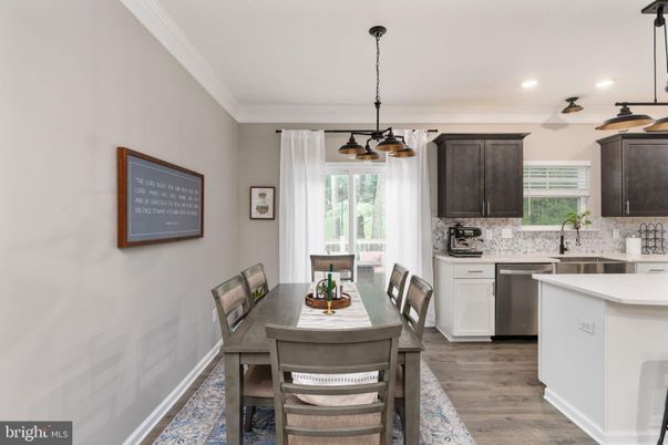 Dining room, Interior, Kitchen, Pendant Lights, Recessed Lighting, Stainless Steel Appliances, Wood Texture Flooring
