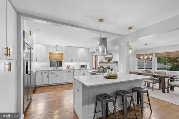 Dining room, Interior, Kitchen, Pendant Lights, Recessed Lighting, Stainless Steel Appliances, Water, Wood Texture Flooring