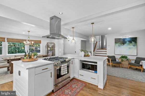 Dining room, Interior, Kitchen, Pendant Lights, Recessed Lighting, Stainless Steel Appliances, Wood Texture Flooring