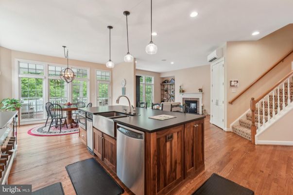 Dining room, Fireplace, Interior, Kitchen, Pendant Lights, Recessed Lighting, Wood Texture Flooring
