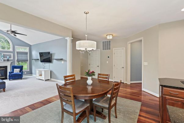 Chandelier, Dining room, Fireplace, Interior, Pendant Lights, Wood Texture Flooring