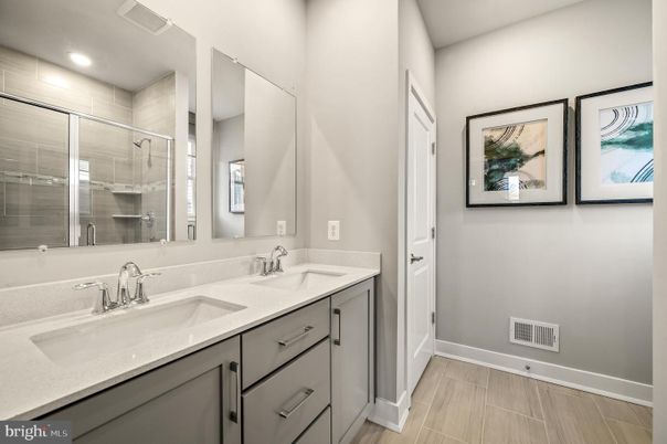 Bathroom, Dual Sink Vanities, Interior, Recessed Lighting, Wood Texture Flooring