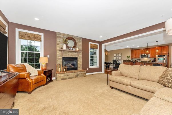 Dining room, Fireplace, Interior, Kitchen, Living room, Pendant Lights, Recessed Lighting, Stainless Steel Appliances, Stone Walls