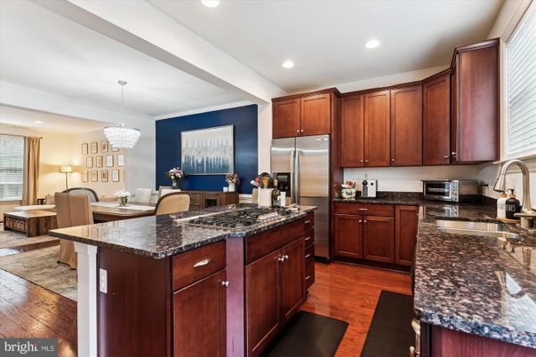 Chandelier, Interior, Kitchen, Recessed Lighting, Stainless Steel Appliances, Wood Texture Flooring