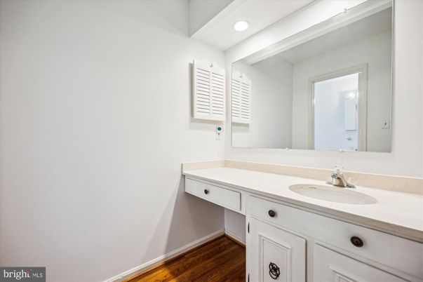 Bathroom, Dual Sink Vanities, Interior, Recessed Lighting, Wood Texture Flooring
