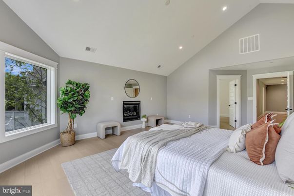 Bedroom, Fireplace, Interior, Recessed Lighting, Wood Texture Flooring