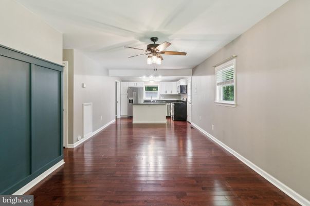 Empty room, Interior, Kitchen, Stainless Steel Appliances, Wood Texture Flooring