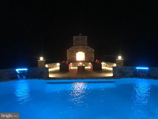 Exterior, Fireplace, Pool