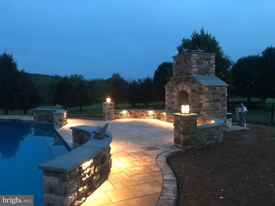 Exterior, Fireplace, Pool