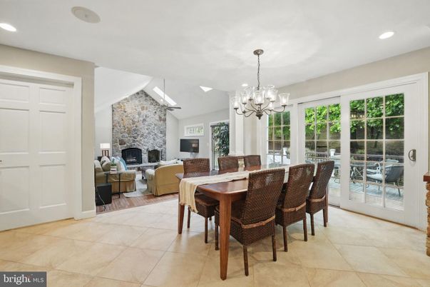 Chandelier, Dining room, Fireplace, Interior, Living room, Recessed Lighting, Stone Walls