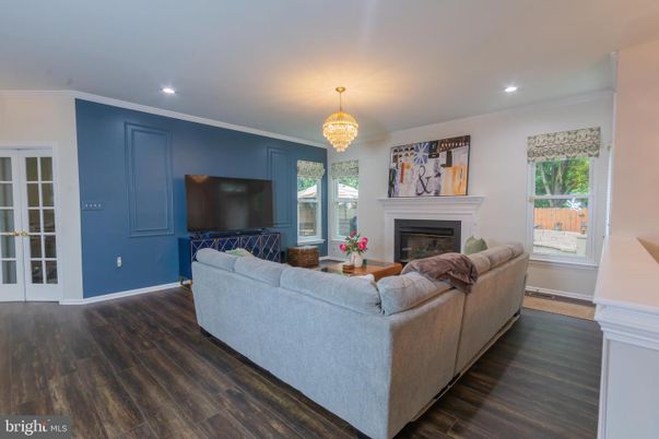 Chandelier, Fireplace, Interior, Living room, Recessed Lighting, Wood Texture Flooring
