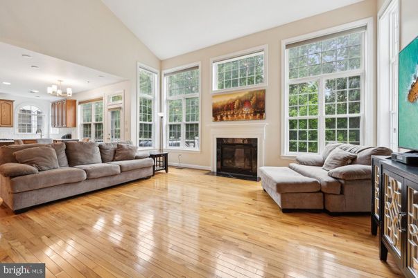 Chandelier, Fireplace, Interior, Living room, Recessed Lighting, Wood Texture Flooring