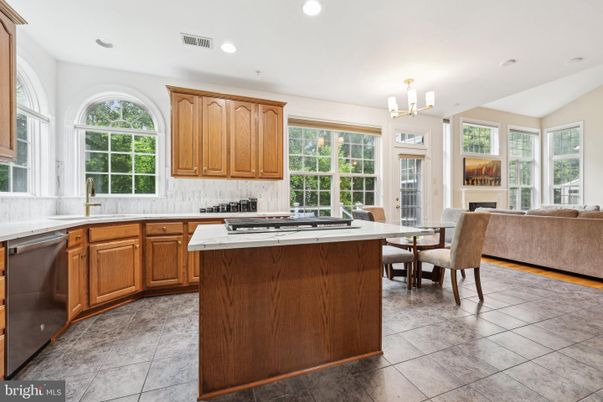 Chandelier, Dining room, Interior, Kitchen, Living room, Recessed Lighting, Stainless Steel Appliances