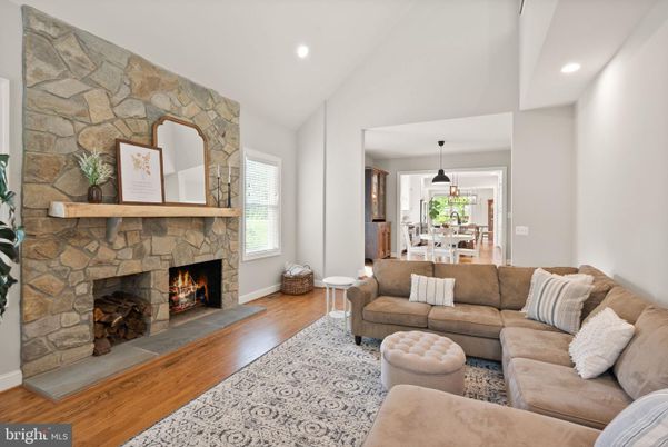 Dining room, Fireplace, Interior, Living room, Pendant Lights, Recessed Lighting, Stone Walls, Wood Texture Flooring