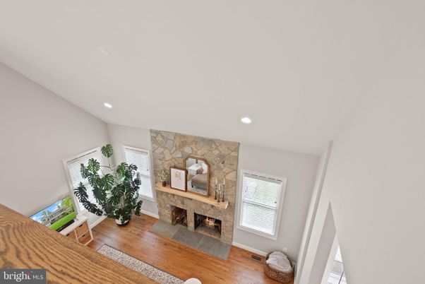 Fireplace, Interior, Recessed Lighting, Stone Walls, Wood Texture Flooring