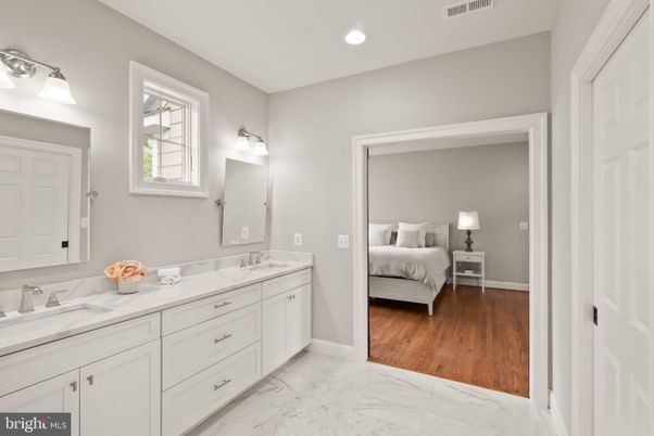 Bathroom, Bedroom, Dual Sink Vanities, Interior, Marble, Recessed Lighting, Wood Texture Flooring