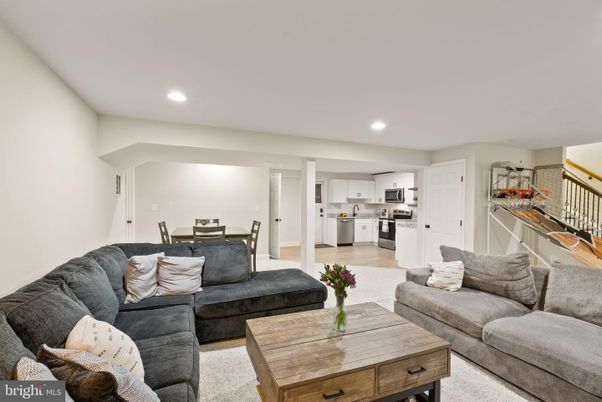 Dining room, Interior, Kitchen, Living room, Recessed Lighting, Stainless Steel Appliances, Wood Texture Flooring