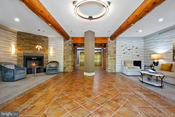 Fireplace, Interior, Living room, Recessed Lighting, Stone Walls, Wooden Beams