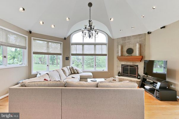 Chandelier, Fireplace, Interior, Living room, Recessed Lighting, Wood Texture Flooring