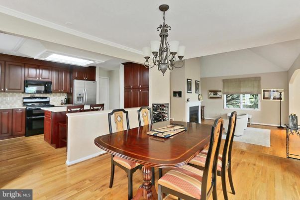 Chandelier, Dining room, Interior, Kitchen, Stainless Steel Appliances, Wood Texture Flooring