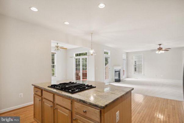 Fireplace, Interior, Kitchen, Pendant Lights, Recessed Lighting, Wood Texture Flooring